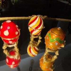 Three Miniature Enameled Eggs Made by Work of Art